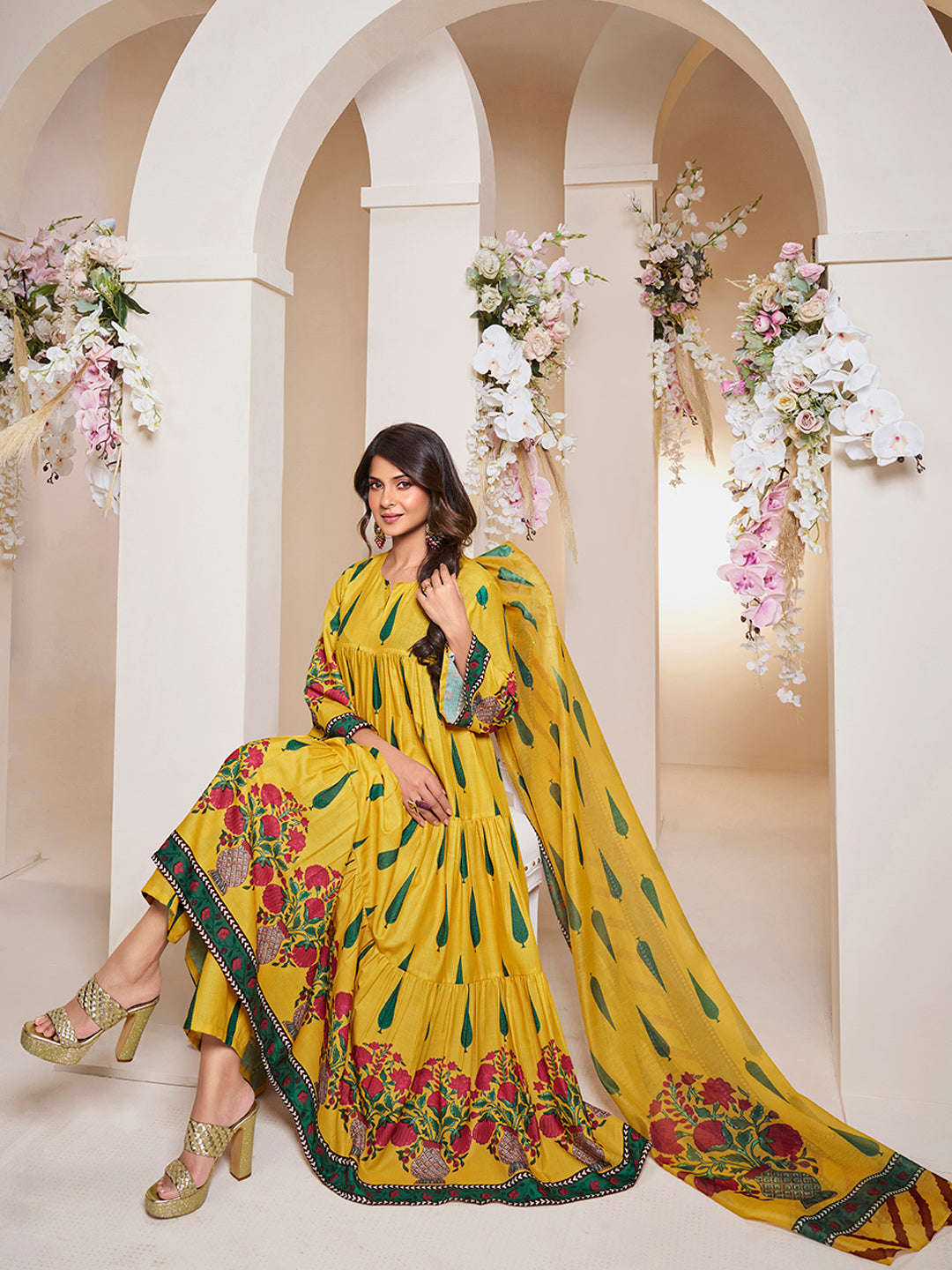 Bhama Couture Jennifer Winget Yellow Leaf Floral Printed Anarkali Flared Kurta with Palazzos Dupatta.