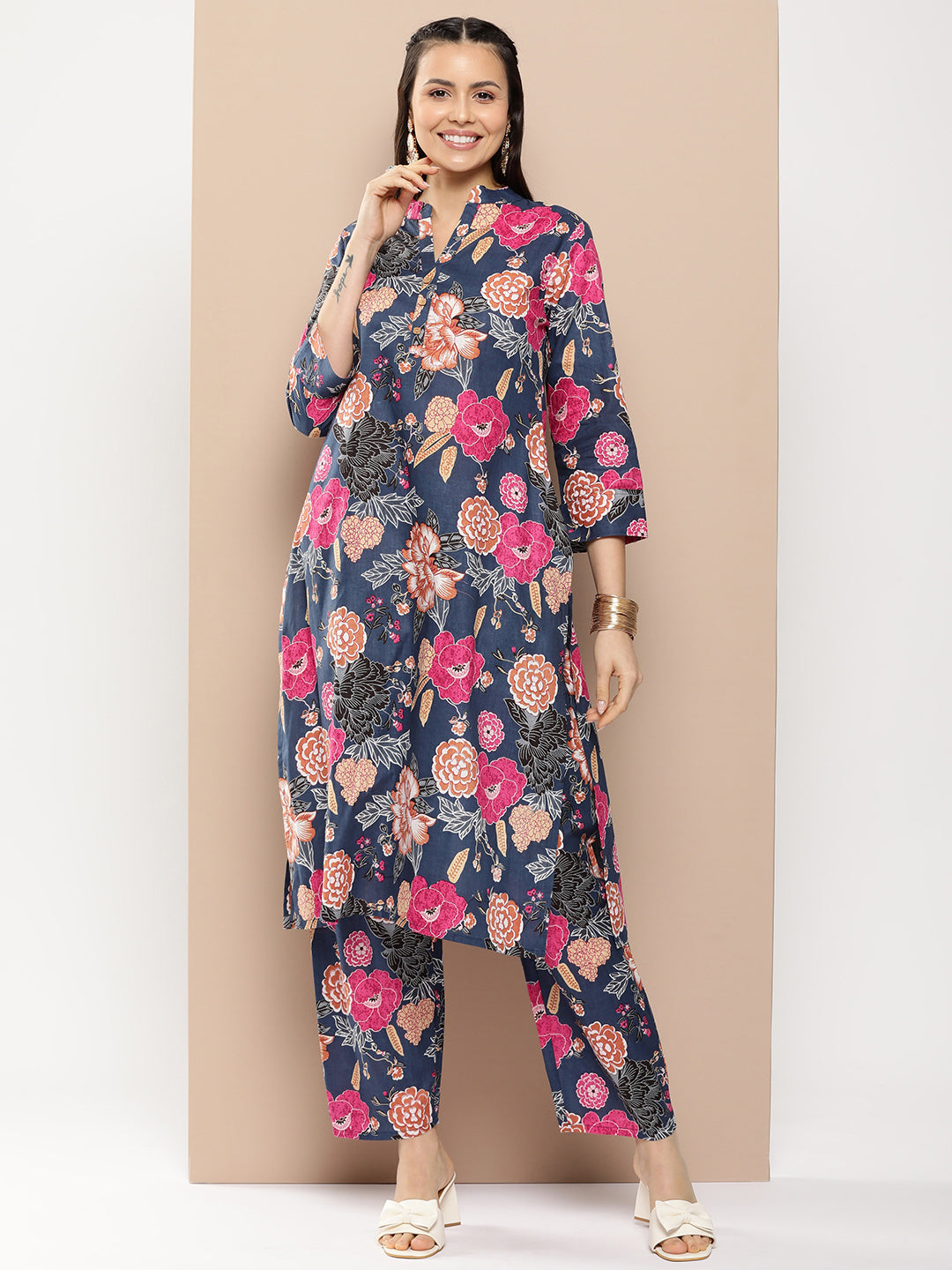 Bhama Couture Blue Floral Print Kurta With Blue Floral Print Trousers.