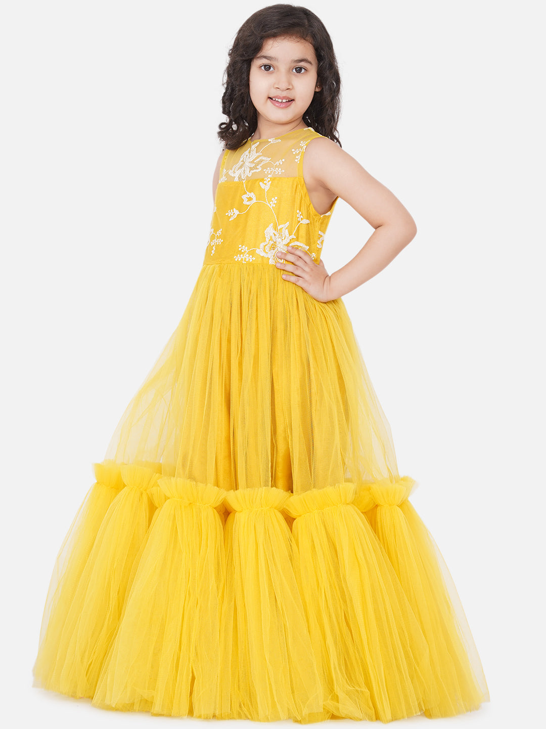 Bitiya By Bhama Yellow Net Embroidered Gown Dress.