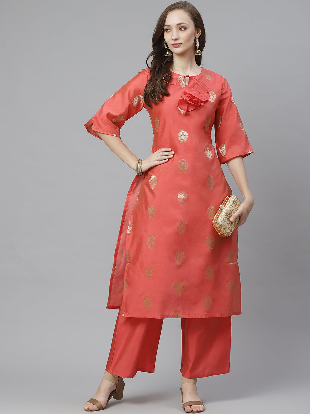 Coral pink and golden woven design kurta with palazzos