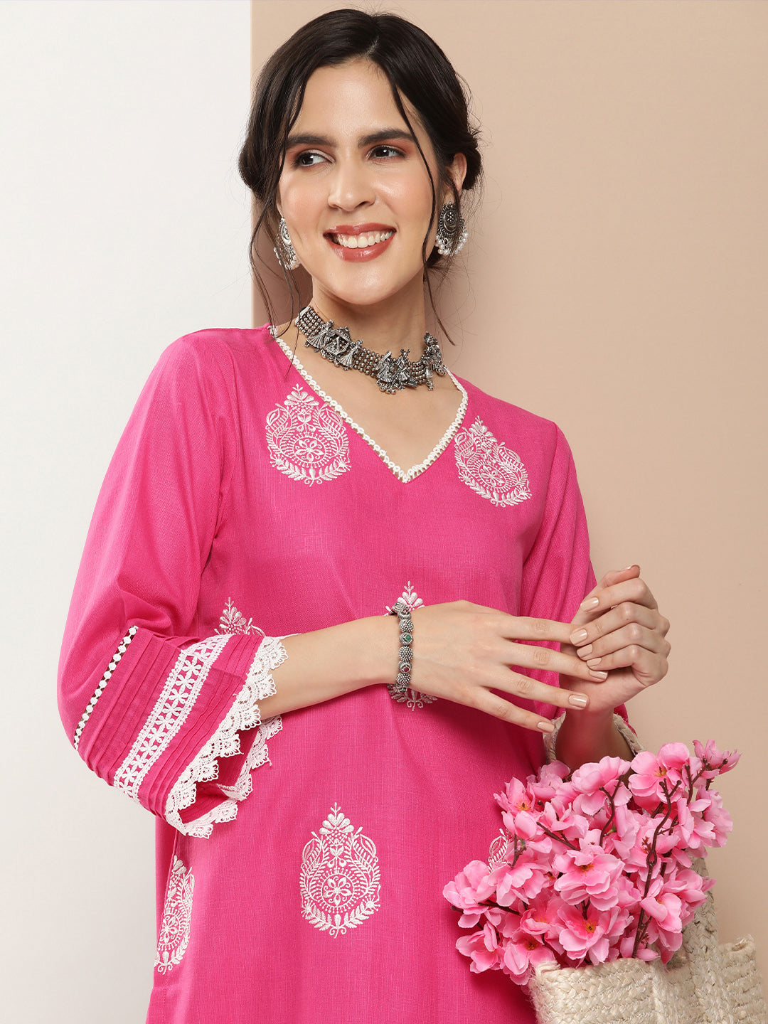 Bhama Couture Pink Embroidered Kurta With Solid Pink Palazzo.